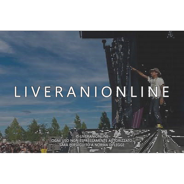 Grammy, BET Music and MTV Africa Music Award winning Pharrell Williams performing live in concert on the mains stage at Wireless 2014 LONDON, Friday, Day One at Finsbury Park, London, United Kingdom Date: 04/07/2014