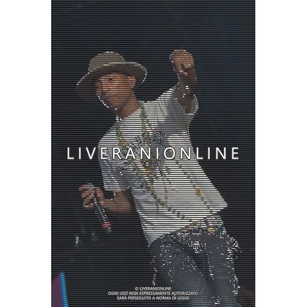 Grammy, BET Music and MTV Africa Music Award winning Pharrell Williams performing live in concert on the mains stage at Wireless 2014 LONDON, Friday, Day One at Finsbury Park, London, United Kingdom Date: 04/07/2014