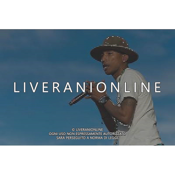 Grammy, BET Music and MTV Africa Music Award winning Pharrell Williams performing live in concert on the mains stage at Wireless 2014 LONDON, Friday, Day One at Finsbury Park, London, United Kingdom Date: 04/07/2014