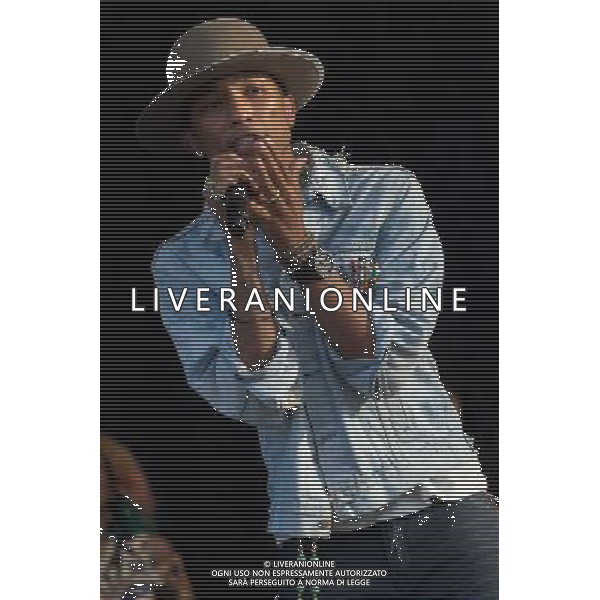 Grammy, BET Music and MTV Africa Music Award winning Pharrell Williams performing live in concert on the mains stage at Wireless 2014 LONDON, Friday, Day One at Finsbury Park, London, United Kingdom Date: 04/07/2014