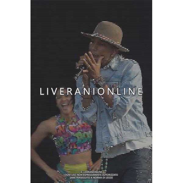 Grammy, BET Music and MTV Africa Music Award winning Pharrell Williams performing live in concert on the mains stage at Wireless 2014 LONDON, Friday, Day One at Finsbury Park, London, United Kingdom Date: 04/07/2014