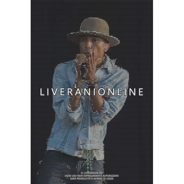 Grammy, BET Music and MTV Africa Music Award winning Pharrell Williams performing live in concert on the mains stage at Wireless 2014 LONDON, Friday, Day One at Finsbury Park, London, United Kingdom Date: 04/07/2014