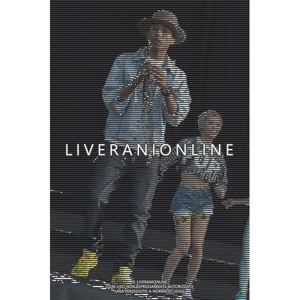Grammy, BET Music and MTV Africa Music Award winning Pharrell Williams performing live in concert on the mains stage at Wireless 2014 LONDON, Friday, Day One at Finsbury Park, London, United Kingdom Date: 04/07/2014