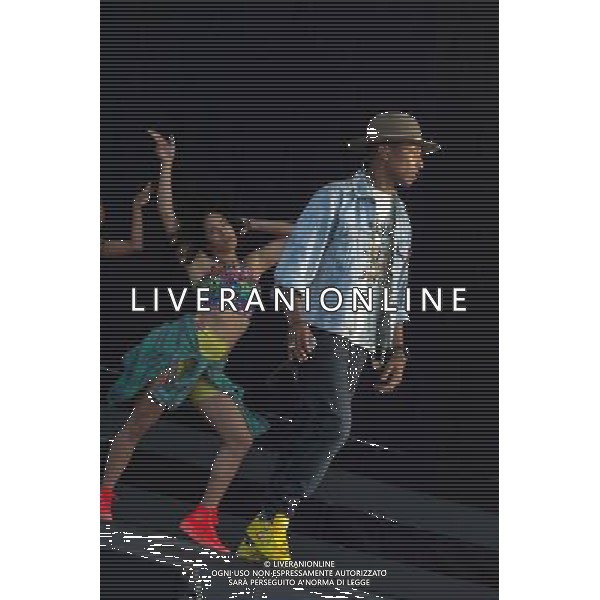 Grammy, BET Music and MTV Africa Music Award winning Pharrell Williams performing live in concert on the mains stage at Wireless 2014 LONDON, Friday, Day One at Finsbury Park, London, United Kingdom Date: 04/07/2014