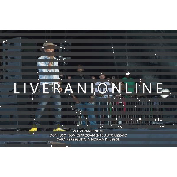 Grammy, BET Music and MTV Africa Music Award winning Pharrell Williams performing live in concert on the mains stage at Wireless 2014 LONDON, Friday, Day One at Finsbury Park, London, United Kingdom Date: 04/07/2014
