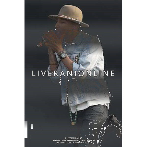 Grammy, BET Music and MTV Africa Music Award winning Pharrell Williams performing live in concert on the mains stage at Wireless 2014 LONDON, Friday, Day One at Finsbury Park, London, United Kingdom Date: 04/07/2014