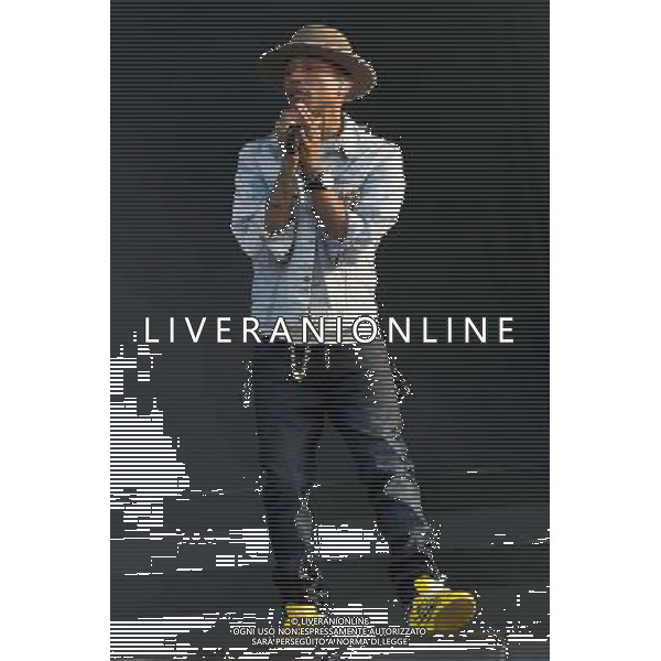 Grammy, BET Music and MTV Africa Music Award winning Pharrell Williams performing live in concert on the mains stage at Wireless 2014 LONDON, Friday, Day One at Finsbury Park, London, United Kingdom Date: 04/07/2014