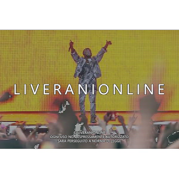 Kanye West wearing a bejewelled mask headlines the mains stage at Wireless 2014 LONDON, Friday, Day One at Finsbury Park, London, United Kingdom Date: 04/07/2014 AG ALDO LIVERANI SAS ONLY ITALY