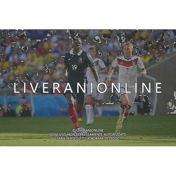 Paul POGBA / Bastian SCHWEINSTEIGER - 04.07.2014 - France / Allemagne - 1/4Finale Coupe du Monde 2014 -Rio de Janeiro- Photo : Dave Winter / Icon Sport AG ALDO LIVERANI SAS ONLY ITALY