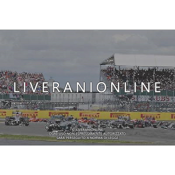 Nico Rosberg (GER) Mercedes AMG F1 W05 leads at the start of the race. 06.07.2014. Formula 1 World Championship, Rd 9, British Grand Prix, Silverstone, England, Race Day. - www.xpbimages.com, EMail: requests@xpbimages.com - copy of publication required for printed pictures. Every used picture is fee-liable. © Copyright: Photo4 / XPB Images AG ALDO LIVERANI SAS ONLY ITALY