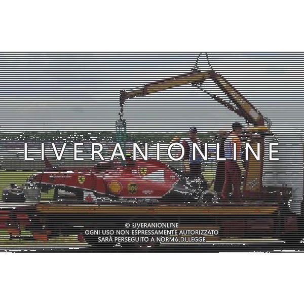 The Ferrari F14-T of Kimi Raikkonen (FIN) Ferrari is recovered back to the pits on the back of a truck after he crashed heavily at the start of the race. 06.07.2014. Formula 1 World Championship, Rd 9, British Grand Prix, Silverstone, England, Race Day. - www.xpbimages.com, EMail: requests@xpbimages.com - copy of publication required for printed pictures. Every used picture is fee-liable. © Copyright: Photo4 / XPB Images AG ALDO LIVERANI SAS ONLY ITALY