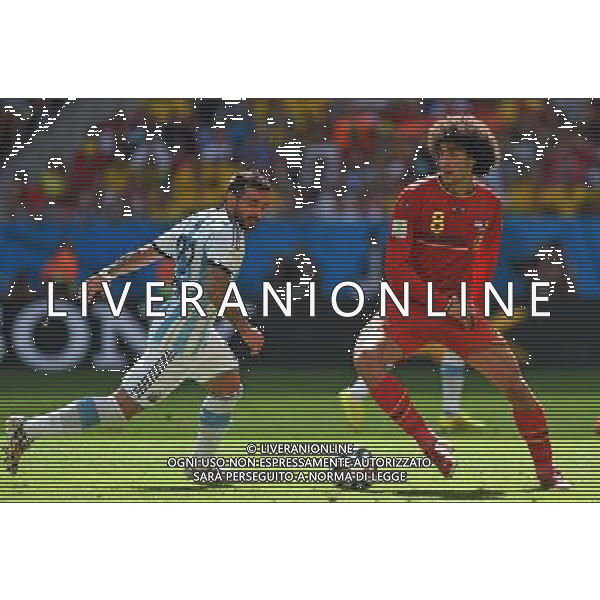 EZEQUIEL LAVEZZI (L) I MAROUANE FELLAINI 2014.07.05 ESTADIO NATIONAL DE BRASILIA GARRINCHA BRAZYLIA PILKA NOZNA MISTRZOSTWA SWIATA FIFA WORLD CUP 2014 KADRA REPREZENTACJA ARGENTYNA - BELGIA FOTO PAULA DUDA / PRESSFOCUS/NEWSPIX.PL --- Newspix.pl AG ALDOL IVERANI SAS ONLY ITALY *** Local Caption *** www.newspix.pl mail us: info@newspix.pl call us: 0048 022 23 22 222 --- Polish Picture Agency by Ringier Axel Springer Poland