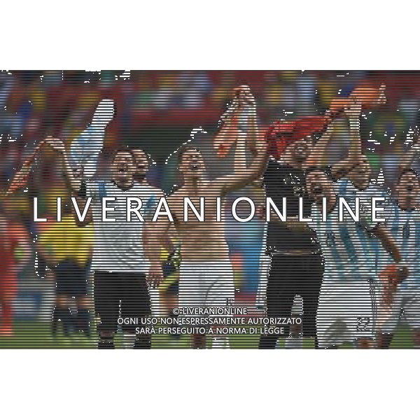 RADOSC EZEQUIEL LAVEZZI MARTIN DEMICHELIS 2014.07.05 ESTADIO NATIONAL DE BRASILIA GARRINCHA BRAZYLIA PILKA NOZNA MISTRZOSTWA SWIATA FIFA WORLD CUP 2014 KADRA REPREZENTACJA ARGENTYNA - BELGIA FOTO PAULA DUDA / PRESSFOCUS/NEWSPIX.PL --- Newspix.pl AG ALDOL IVERANI SAS ONLY ITALY *** Local Caption *** www.newspix.pl mail us: info@newspix.pl call us: 0048 022 23 22 222 --- Polish Picture Agency by Ringier Axel Springer Poland