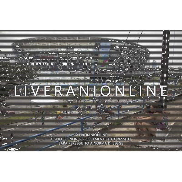 (140705) -- SALVADOR, July 5, 2014 () -- Local residents sit on stairs near the Arena Fonte Nova Stadium prior to a quarter-finals match between Netherlands and Costa Rica of 2014 FIFA World Cup in Salvador, Brazil, on July 5, 2014. (/Guillermo Arias)(xzj) ©photoshot/Agenzia Aldo Liverani sas - ITALY ONLY - EDITORIAL USE ONLY - Olanda vs Costa Rica partita di quarti di finale Coppa del mondo FIFA 2014 in Salvador, in Brasile, il 5 luglio 2014.