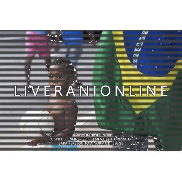 (140705) -- SALVADOR, July 5, 2014 () -- A boy looks on outside the Arena Fonte Nova Stadium prior to a quarter-finals match between Netherlands and Costa Rica of 2014 FIFA World Cup in Salvador, Brazil, on July 5, 2014. (/Guillermo Arias)(xzj) ©photoshot/Agenzia Aldo Liverani sas - ITALY ONLY - EDITORIAL USE ONLY - Olanda vs Costa Rica partita di quarti di finale Coppa del mondo FIFA 2014 in Salvador, in Brasile, il 5 luglio 2014.