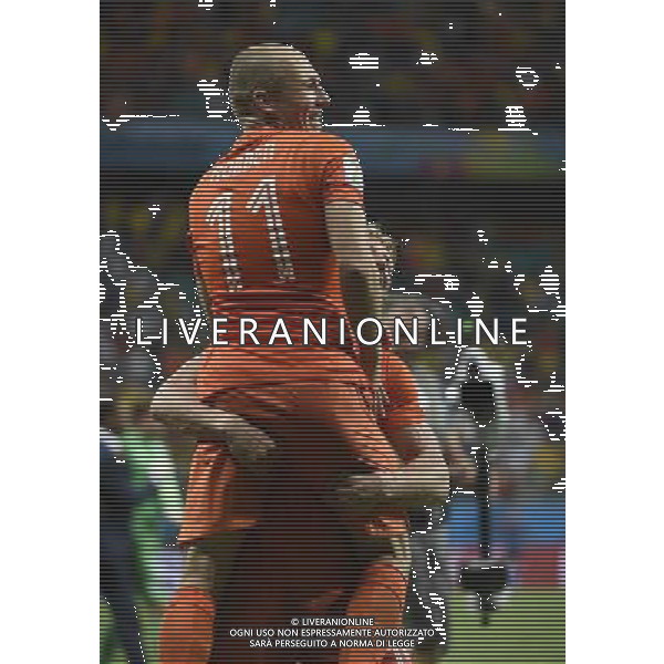 (140705) -- SALVADOR, July 5, 2014 () -- Netherlands\' Arjen Robben (up) celebrates the victory after a quarter-finals match between Netherlands and Costa Rica of 2014 FIFA World Cup at the Arena Fonte Nova Stadium in Salvador, Brazil, on July 5, 2014. Netherlands won 4-3 on penalties over Costa Rica after a 0-0 tie and qualified for semi-finals on Saturday.(/Lui Siu Wai)(rh) ©photoshot/Agenzia Aldo Liverani sas - ITALY ONLY - EDITORIAL USE ONLY - Olanda vs Costa Rica partita di quarti di finale Coppa del mondo FIFA 2014 in Salvador, in Brasile, il 5 luglio 2014.