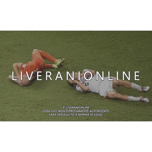 (140705) -- SALVADOR, July 5, 2014 () -- Netherlands\' Arjen Robben (L) and Costa Rica\'s Johnny Acosta lie on the ground during a quarter-finals match between Netherlands and Costa Rica of 2014 FIFA World Cup at the Arena Fonte Nova Stadium in Salvador, Brazil, on July 5, 2014.(/Yang Lei)(xzj) ©photoshot/Agenzia Aldo Liverani sas - ITALY ONLY - EDITORIAL USE ONLY - Olanda vs Costa Rica partita di quarti di finale Coppa del mondo FIFA 2014 in Salvador, in Brasile, il 5 luglio 2014.