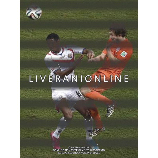 (140705) -- SALVADOR, July 5, 2014 () -- Netherlands\' Daley Blind (R) vies with Costa Rica\'s Heiner Mora during a quarter-finals match between Netherlands and Costa Rica of 2014 FIFA World Cup at the Arena Fonte Nova Stadium in Salvador, Brazil, on July 5, 2014.(/Yang Lei)(xzj) ©photoshot/Agenzia Aldo Liverani sas - ITALY ONLY - EDITORIAL USE ONLY - Olanda vs Costa Rica partita di quarti di finale Coppa del mondo FIFA 2014 in Salvador, in Brasile, il 5 luglio 2014.