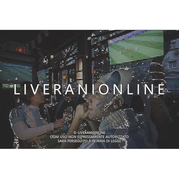 (140705) -- BUENOS AIRES, July 5, 2014 () -- Argentina\'s fans watch a quarter-finals match between Argentina and Belgium of 2014 FIFA World Cup at a bar in Buenos Aires, Argentina, on July 5, 2014. Argentina won 1-0 over Belgium and qualified for the semi-finals on Saturday. (/Martin Zabala)(pcy) ©photoshot/Agenzia Aldo Liverani sas - ITALY ONLY - EDITORIAL USE ONLY - ARGENTINA VS BELGIO partita di quarti di finale Coppa del Mondo 2014 FIFA World Cup allo stadio Estadio Nacional di Brasilia, in Brasile, il 5 luglio 2014. Argentina ha vinto 1-0 contro il Belgio e si qualifica per le semifinali.