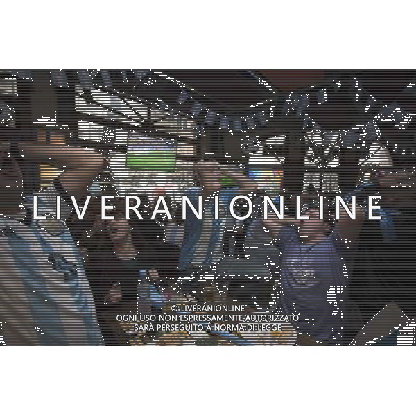 (140705) -- BUENOS AIRES, July 5, 2014 () -- Argentina\'s fans react while watching a quarter-finals match between Argentina and Belgium of 2014 FIFA World Cup at a bar in Buenos Aires, Argentina, on July 5, 2014. Argentina won 1-0 over Belgium and qualified for the semi-finals. (/Martin Zabala)(pcy) ©photoshot/Agenzia Aldo Liverani sas - ITALY ONLY - EDITORIAL USE ONLY - ARGENTINA VS BELGIO partita di quarti di finale Coppa del Mondo 2014 FIFA World Cup allo stadio Estadio Nacional di Brasilia, in Brasile, il 5 luglio 2014. Argentina ha vinto 1-0 contro il Belgio e si qualifica per le semifinali.
