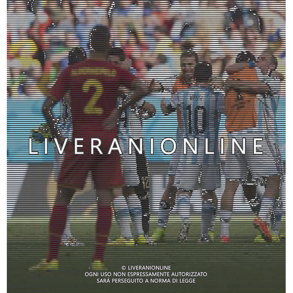 (140705) -- BRASILIA, July 5, 2014 () -- Belgium\'s Toby Alderweireld (front) reacts as Argentina\'s players celebrate their victory after a quarter-finals match between Argentina and Belgium of 2014 FIFA World Cup at the Estadio Nacional Stadium in Brasilia, Brazil, on July 5, 2014. Argentina won 1-0 over Belgium and qualified for the semi-finals. (/Qi Heng)(pcy) ©photoshot/Agenzia Aldo Liverani sas - ITALY ONLY - EDITORIAL USE ONLY - ARGENTINA VS BELGIO partita di quarti di finale Coppa del Mondo 2014 FIFA World Cup allo stadio Estadio Nacional di Brasilia, in Brasile, il 5 luglio 2014. Argentina ha vinto 1-0 contro il Belgio e si qualifica per le semifinali.