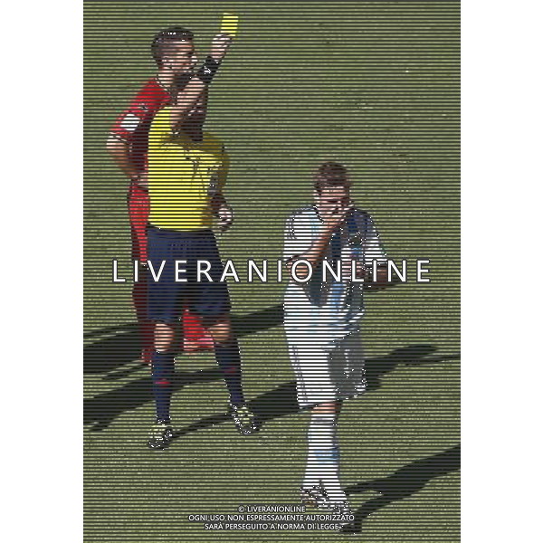 (140705) -- BRASILIA, July 5, 2014 () -- Referee Nicola Rizzoli gives a yellow card to Argentina\'s Lucas Biglia (R) during a quarter-finals match between Argentina and Belgium of 2014 FIFA World Cup at the Estadio Nacional Stadium in Brasilia, Brazil, on July 5, 2014. Argentina won 1-0 over Belgium and qualified for the semi-finals. (/Liu Bin)(xzj) ©photoshot/Agenzia Aldo Liverani sas - ITALY ONLY - EDITORIAL USE ONLY - ARGENTINA VS BELGIO partita di quarti di finale Coppa del Mondo 2014 FIFA World Cup allo stadio Estadio Nacional di Brasilia, in Brasile, il 5 luglio 2014. Argentina ha vinto 1-0 contro il Belgio e si qualifica per le semifinali.