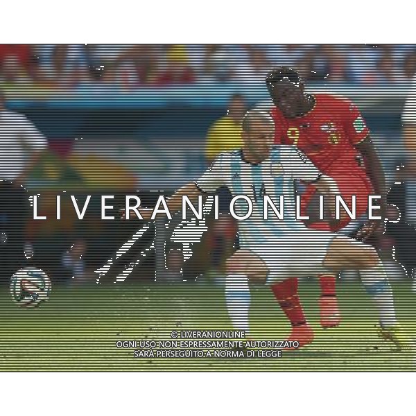 (140705) -- BRASILIA, July 5, 2014 () -- Belgium\'s Romelu Lukaku (back) shoots the ball during a quarter-finals match between Argentina and Belgium of 2014 FIFA World Cup at the Estadio Nacional Stadium in Brasilia, Brazil, on July 5, 2014. Argentina won 1-0 over Belgium and qualified for the semi-finals. (/Li Ming)(xzj) ©photoshot/Agenzia Aldo Liverani sas - ITALY ONLY - EDITORIAL USE ONLY - ARGENTINA VS BELGIO partita di quarti di finale Coppa del Mondo 2014 FIFA World Cup allo stadio Estadio Nacional di Brasilia, in Brasile, il 5 luglio 2014. Argentina ha vinto 1-0 contro il Belgio e si qualifica per le semifinali.