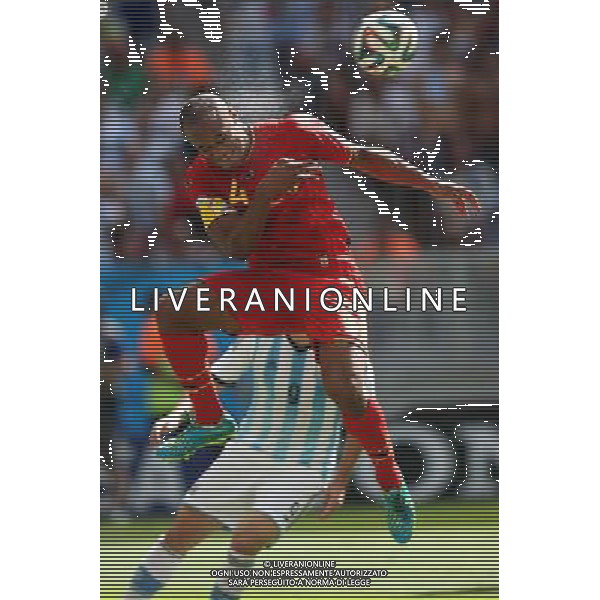 (140705) -- BRASILIA, July 5, 2014 () -- Belgium\'s Vincent Kompany (front) competes for a header during a quarter-finals match between Argentina and Belgium of 2014 FIFA World Cup at the Estadio Nacional Stadium in Brasilia, Brazil, on July 5, 2014.(/Li Ming)(xzj) ©photoshot/Agenzia Aldo Liverani sas - ITALY ONLY - EDITORIAL USE ONLY - ARGENTINA VS BELGIO partita di quarti di finale Coppa del Mondo 2014 FIFA World Cup allo stadio Estadio Nacional di Brasilia, in Brasile, il 5 luglio 2014. Argentina ha vinto 1-0 contro il Belgio e si qualifica per le semifinali.