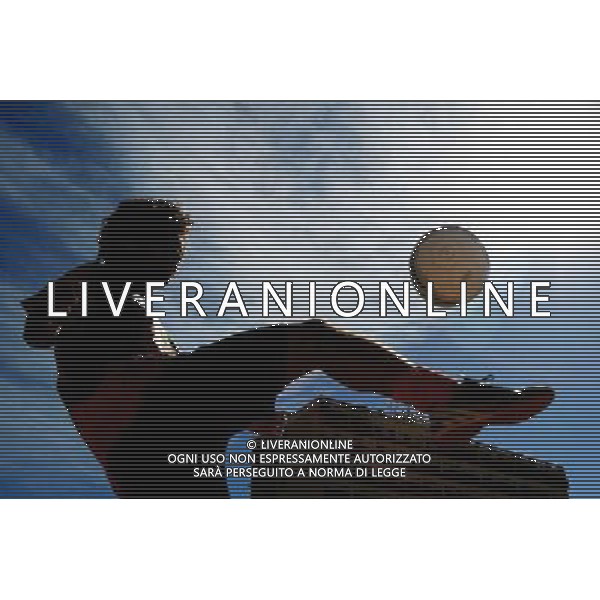 (140706) -- SAO PAULO, July 6, 2014 () -- A man participates in a match of a \'Rebel Cup\' football tournament in downtown Sao Paulo, Brazil, July 6, 2014. According to the organizer, the \'Rebel Cup\' is an informal football tournament held to protest against the \'improper\' expenditure spent by government during the preparation of World Cup 2014. (/Rahel Patrasso)(xzj) ©PHOTOSHOT/Agenzia Aldo Liverani sas - ITALY ONLY - EDITORIAL USE ONLY - Torneo di calcio informale \'Rebel Cup\' coppa Ribelle nel centro di Sao Paulo, Brasile, 6 luglio 2014 per protestare contro le spese eccessive del governo per la Coppa del Mondo FIFA 2014