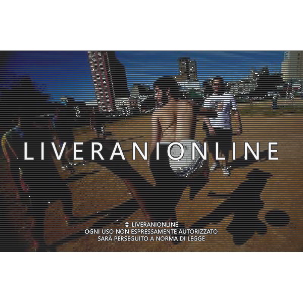 (140706) -- SAO PAULO, July 6, 2014 () -- A man controls the ball during a match of a \'Rebel Cup\' football tournament in downtown Sao Paulo, Brazil, July 6, 2014. According to the organizer, the \'Rebel Cup\' is an informal football tournament held to protest against the \'improper\' expenditure spent by government during the preparation of World Cup 2014. (/Rahel Patrasso)(xzj) ©PHOTOSHOT/Agenzia Aldo Liverani sas - ITALY ONLY - EDITORIAL USE ONLY - Torneo di calcio informale \'Rebel Cup\' coppa Ribelle nel centro di Sao Paulo, Brasile, 6 luglio 2014 per protestare contro le spese eccessive del governo per la Coppa del Mondo FIFA 2014