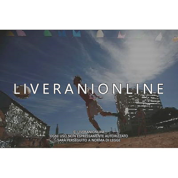 (140706) -- SAO PAULO, July 6, 2014 () -- A man competes to control the ball during a match of a \'Rebel Cup\' football tournament in downtown Sao Paulo, Brazil, July 6, 2014. According to the organizer, the \'Rebel Cup\' is an informal football tournament held to protest against the \'improper\' expenditure spent by government during the preparation of World Cup 2014. (/Rahel Patrasso)(xzj) ©PHOTOSHOT/Agenzia Aldo Liverani sas - ITALY ONLY - EDITORIAL USE ONLY - Torneo di calcio informale \'Rebel Cup\' coppa Ribelle nel centro di Sao Paulo, Brasile, 6 luglio 2014 per protestare contro le spese eccessive del governo per la Coppa del Mondo FIFA 2014