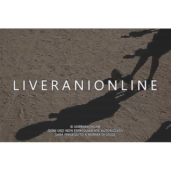 (140706) -- SAO PAULO, July 6, 2014 () -- A man participates in a match of a \'Rebel Cup\' football tournament in downtown Sao Paulo, Brazil, July 6, 2014. According to the organizer, the \'Rebel Cup\' is an informal football tournament held to protest against the \'improper\' expenditure spent by government during the preparation of World Cup 2014. (/Rahel Patrasso)(xzj) ©PHOTOSHOT/Agenzia Aldo Liverani sas - ITALY ONLY - EDITORIAL USE ONLY - Torneo di calcio informale \'Rebel Cup\' coppa Ribelle nel centro di Sao Paulo, Brasile, 6 luglio 2014 per protestare contro le spese eccessive del governo per la Coppa del Mondo FIFA 2014