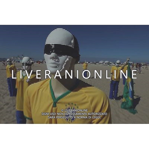 (140706) -- RIO DE JANEIRO, July 6, 2014 () -- Mannequins with their eyes covered are seen during a protest against the high cost of the FIFA World Cup Brazil 2014, at Copacabana Beach, in Rio de Janeiro, Brazil, on July 6, 2014. According to the local press, twelve mannequins representing the World Cup\'s twelve host cities, were exhibited during the protest. (/AGENCIA ESTADO) (ce) ***BRAZIL OUT*** ©PHOTOSHOT/Agenzia Aldo Liverani sas - ITALY ONLY - EDITORIAL USE ONLY - Manichini con i loro occhi coperti da una fascia per una manifestazione di protesta sulla spiaggia di Copacabana, a Rio de Janeiro contro le spese eccessive della coppa del mondo FIFA Brasile 2014, 6 luglio 2014.