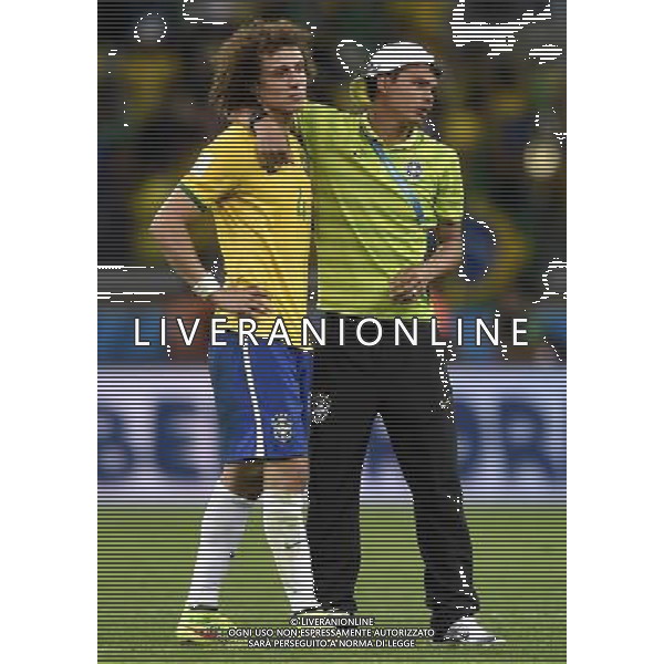 (140708) -- BELO HORIZONTE, July 8, 2014 () -- Brazil\'s David Luiz (L) is consoled by Thiago Silva after a semifinal match between Brazil and Germany of 2014 FIFA World Cup at the Estadio Mineirao Stadium in Belo Horizonte, Brazil, on July 8, 2014. Germany won 7-1 over Brazil and qualified for the final on Tuesday. (/Qi Heng)(pcy) AG ALDO LIVERANI SAS ONLY ITALY