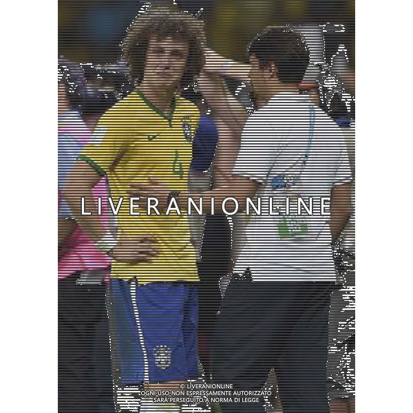(140708) -- BELO HORIZONTE, July 8, 2014 () -- Brazil\'s David Luiz (L) looks on with tears after a semifinal match between Brazil and Germany of 2014 FIFA World Cup at the Estadio Mineirao Stadium in Belo Horizonte, Brazil, on July 8, 2014. Germany won 7-1 over Brazil and qualified for the final on Tuesday. (/Qi Heng)(pcy) AG ALDO LIVERANI SAS ONLY ITALY