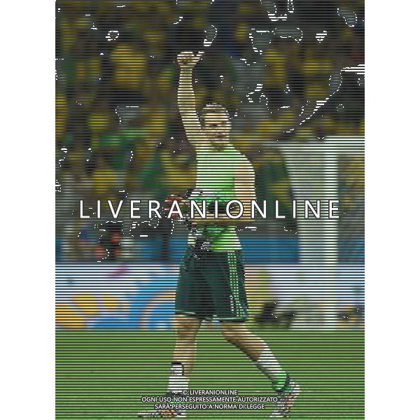 (140708) -- BELO HORIZONTE, July 8, 2014 () -- Germany\'s goalkeeper Manuel Neuer greets Germany\'s fans after a semifinal match between Brazil and Germany of 2014 FIFA World Cup at the Estadio Mineirao Stadium in Belo Horizonte, Brazil, on July 8, 2014. Germany won 7-1 over Brazil and qualified for the final on Tuesday. (/Liu Dawei)(pcy) AG ALDO LIVERANI SAS ONLY ITALY