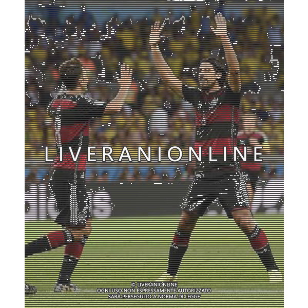 (140708) -- BELO HORIZONTE, July 8, 2014 () -- Germany\'s Sami Khedira (R) celebrates with Mesut Ozil after scoring during a semifinal match between Brazil and Germany of 2014 FIFA World Cup at the Estadio Mineirao Stadium in Belo Horizonte, Brazil, on July 8, 2014.(/Qi Heng)(pcy) AG ALDO LIVERANI SAS ONLY ITALY