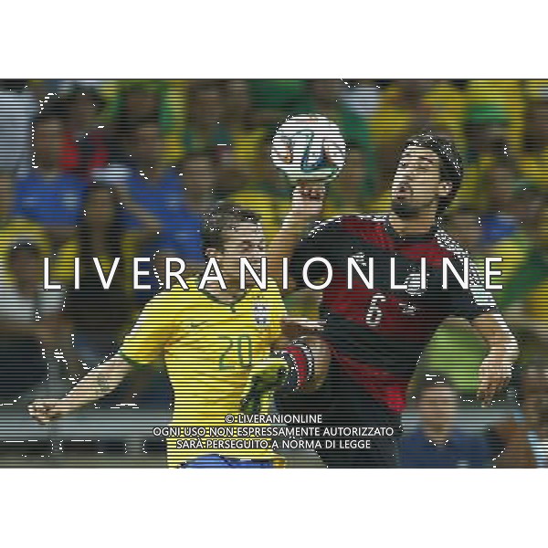 (140708) -- BELO HORIZONTE, July 8, 2014 () -- Brazil\'s Bernard vies with Germany\'s Sami Khedira during a semifinal match between Brazil and Germany of 2014 FIFA World Cup at the Estadio Mineirao Stadium in Belo Horizonte, Brazil, on July 8, 2014.(/Chen Jianli)(rh) AG ALDO LIVERANI SAS ONLY ITALY