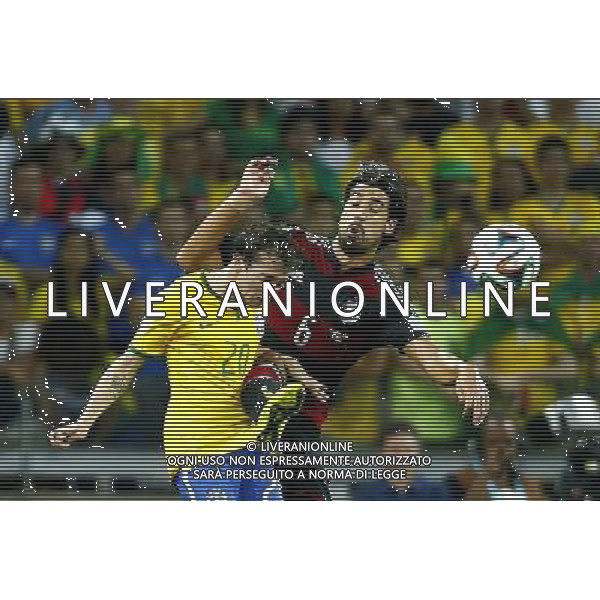 (140708) -- BELO HORIZONTE, July 8, 2014 () -- Brazil\'s Bernard vies with Germany\'s Sami Khedira during a semifinal match between Brazil and Germany of 2014 FIFA World Cup at the Estadio Mineirao Stadium in Belo Horizonte, Brazil, on July 8, 2014.(/Chen Jianli)(rh) AG ALDO LIVERANI SAS ONLY ITALY