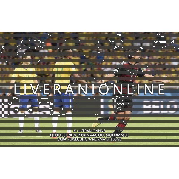 (140708) -- BELO HORIZONTE, July 8, 2014 () -- Germany\'s Sami Khedira (R) celebrates after scoring during a semifinal match between Brazil and Germany of 2014 FIFA World Cup at the Estadio Mineirao Stadium in Belo Horizonte, Brazil, on July 8, 2014.(/Qi Heng)(pcy) AG ALDO LIVERANI SAS ONLY ITALY