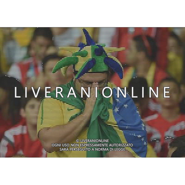 (140708) -- BELO HORIZONTE, July 8, 2014 () -- A Brazil\'s supporter prays during a semifinal match between Brazil and Germany of 2014 FIFA World Cup at the Estadio Mineirao Stadium in Belo Horizonte, Brazil, on July 8, 2014.(/Liu Dawei)(pcy) AG ALDO LIVERANI SAS ONLY ITALY