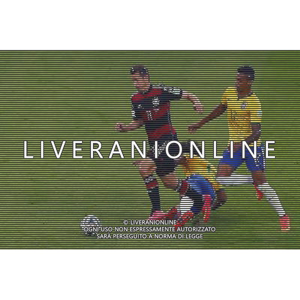 (140708) -- BELO HORIZONTE, July 8, 2014 () -- Germany\'s Miroslav Klose (L) breaks through during a semifinal match between Brazil and Germany of 2014 FIFA World Cup at the Estadio Mineirao Stadium in Belo Horizonte, Brazil, on July 8, 2014.(/Liu Bin)(pcy) AG ALDO LIVERANI SAS ONLY ITALY
