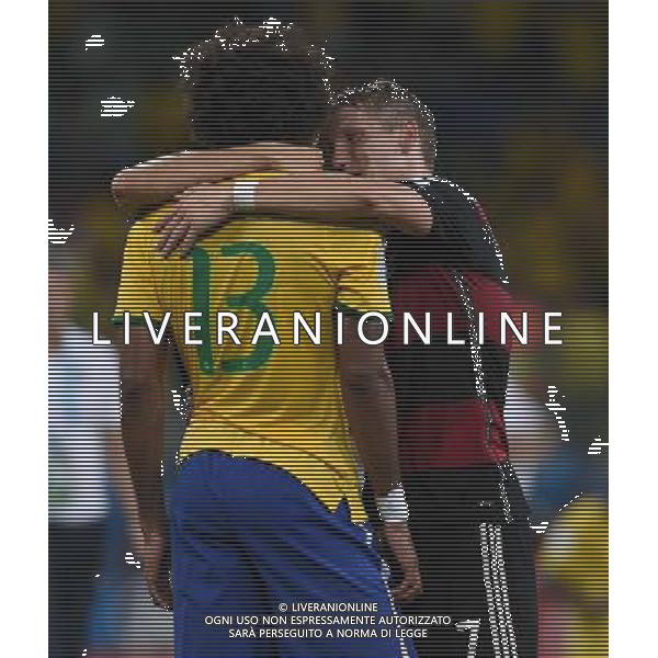 FIFA World Cup Brasile 2014 Semifinali Belo Horizonte - 08.07.2014 Brasile-Germania Nella Foto:schweinsteiger consola dante /Ph.Vitez-Ag. Aldo Liverani