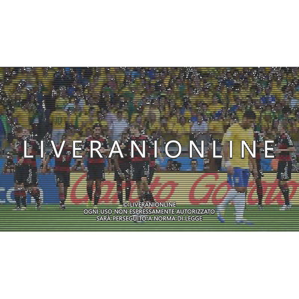 (140708) -- BELO HORIZONTE, July 8, 2014 () -- Germany\'s Thomas Muller (6th L) celebrates with teammates after scoring during a semifinal match between Brazil and Germany of 2014 FIFA World Cup at the Estadio Mineirao Stadium in Belo Horizonte, Brazil, on July 8, 2014. Germany won 7-1 over Brazil and qualified for the final on Tuesday. (/Li Ga)(pcy) ©photoshot/Agenzia Aldo Liverani sas - ITALY ONLY - EDITORIAL USE ONLY - BRASILE VS GERMANIA partita di semifinale Coppa del mondo FIFA 2014 Mineirao stadio Estadio a Belo Horizonte, in Brasile, 8 luglio 2014, la Germania ha vinto 7-1 e qualificato per la finale