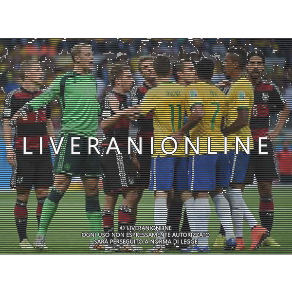 (140708) -- BELO HORIZONTE, July 8, 2014 () -- Players of Germany and Brazil argue during a semifinal match between Brazil and Germany of 2014 FIFA World Cup at the Estadio Mineirao Stadium in Belo Horizonte, Brazil, on July 8, 2014. Germany won 7-1 over Brazil and qualified for the final on Tuesday. (/Li Ga)(pcy) ©photoshot/Agenzia Aldo Liverani sas - ITALY ONLY - EDITORIAL USE ONLY - BRASILE VS GERMANIA partita di semifinale Coppa del mondo FIFA 2014 Mineirao stadio Estadio a Belo Horizonte, in Brasile, 8 luglio 2014, la Germania ha vinto 7-1 e qualificato per la finale