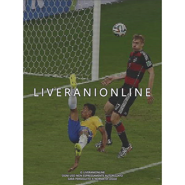 (140708) -- BELO HORIZONTE, July 8, 2014 () -- Brazil\'s Paulinho (L) makes an overhead kick during a semifinal match between Brazil and Germany of 2014 FIFA World Cup at the Estadio Mineirao Stadium in Belo Horizonte, Brazil, on July 8, 2014. Germany won 7-1 over Brazil and qualified for the final on Tuesday. (/Liu Bin)(pcy) ©photoshot/Agenzia Aldo Liverani sas - ITALY ONLY - EDITORIAL USE ONLY - BRASILE VS GERMANIA partita di semifinale Coppa del mondo FIFA 2014 Mineirao stadio Estadio a Belo Horizonte, in Brasile, 8 luglio 2014, la Germania ha vinto 7-1 e qualificato per la finale