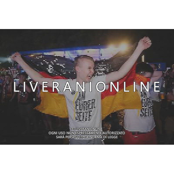 (140709) -- BERLIN, July 9, () -- A German football fan reacts as he watches the 2014 World Cup semifinal match between Germany and Brazil, at a public viewing event in Frankfurt, Germany, July 8, 2014. (/Zhang Fan) ©photoshot/Agenzia Aldo Liverani sas - ITALY ONLY - EDITORIAL USE ONLY