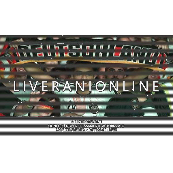 (140709) -- FRANKFURT, July 9, () -- German football fans react as they watch the 2014 World Cup semifinal match between Germany and Brazil, at a public viewing event in Frankfurt, Germany, July 8, 2014. (/Luo Huanhuan) ©photoshot/Agenzia Aldo Liverani sas - ITALY ONLY - EDITORIAL USE ONLY