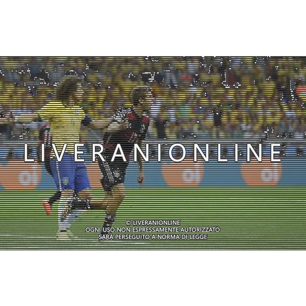 (140708) -- BELO HORIZONTE, July 8, 2014 () -- Germany\'s Thomas Muller (R) celebrates a goal during a semifinal match between Brazil and Germany of 2014 FIFA World Cup at the Estadio Mineirao Stadium in Belo Horizonte, Brazil, on July 8, 2014. Germany won 7-1 over Brazil and qualified for the final on Tuesday.(/Qi Heng)(rh) ©photoshot/Agenzia Aldo Liverani sas - ITALY ONLY - EDITORIAL USE ONLY - BRASILE VS GERMANIA partita di semifinale Coppa del mondo FIFA 2014 Mineirao stadio Estadio a Belo Horizonte, in Brasile, 8 luglio 2014, la Germania ha vinto 7-1 e qualificato per la finale