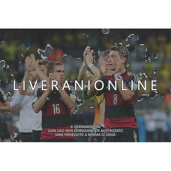 Philipp Lahm (GER) und Mesut Oezil (GER) bedanken sich bei den Fans // during Semi Final match between Brasil and Germany of the FIFA Worldcup Brazil 2014 at the Mineirao in Belo Horizonte, Brazil on 2014/07/08. EXPA Pictures © 2014, PhotoCredit: EXPA/ Eibner-Pressefoto/ Cezaro *****ATTENTION - OUT of GER***** AG ALDO LIVERANI SAS ONLY ITALY